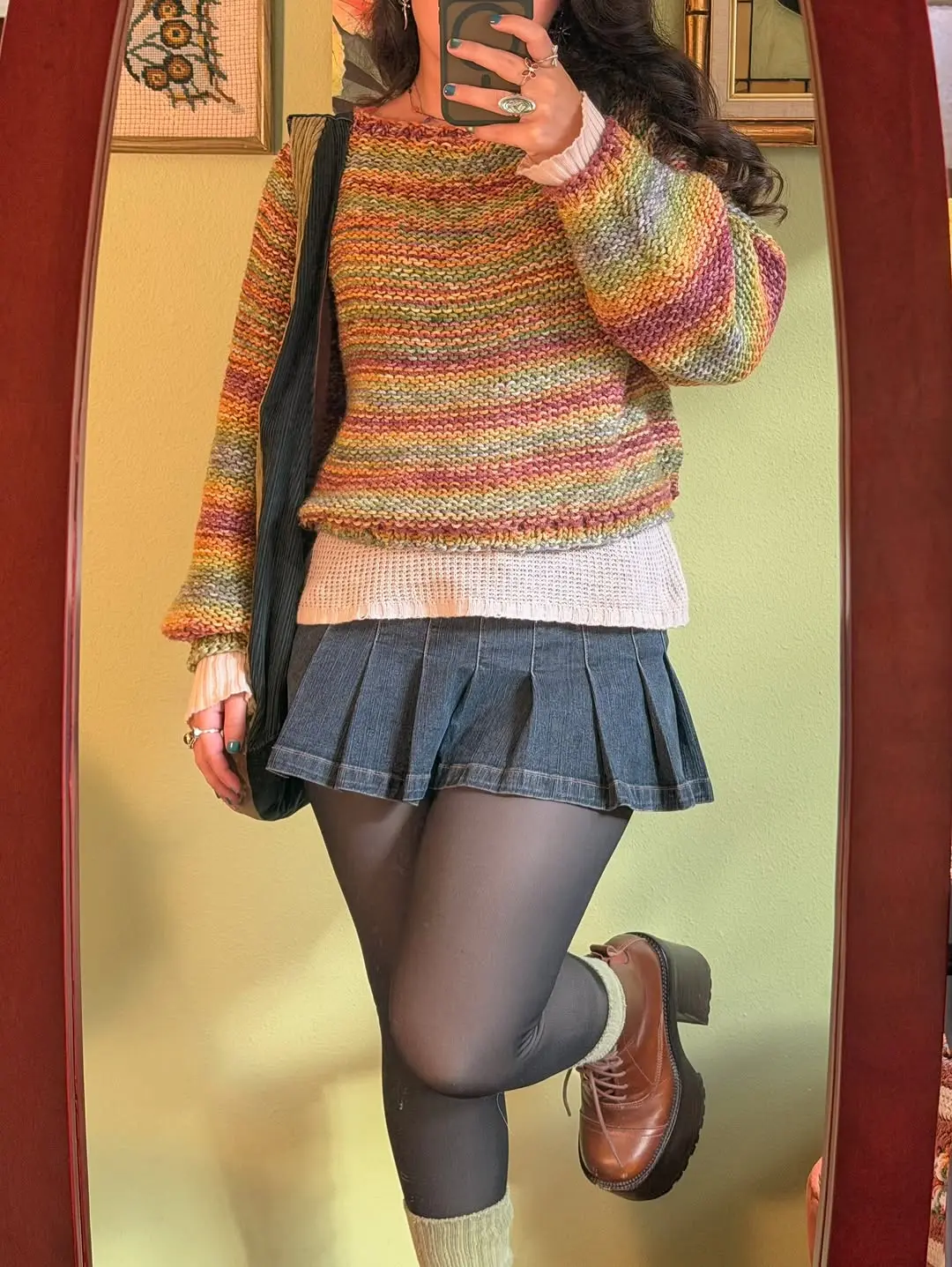 Playful Pastel Sweater Paired with Pleated Skirt