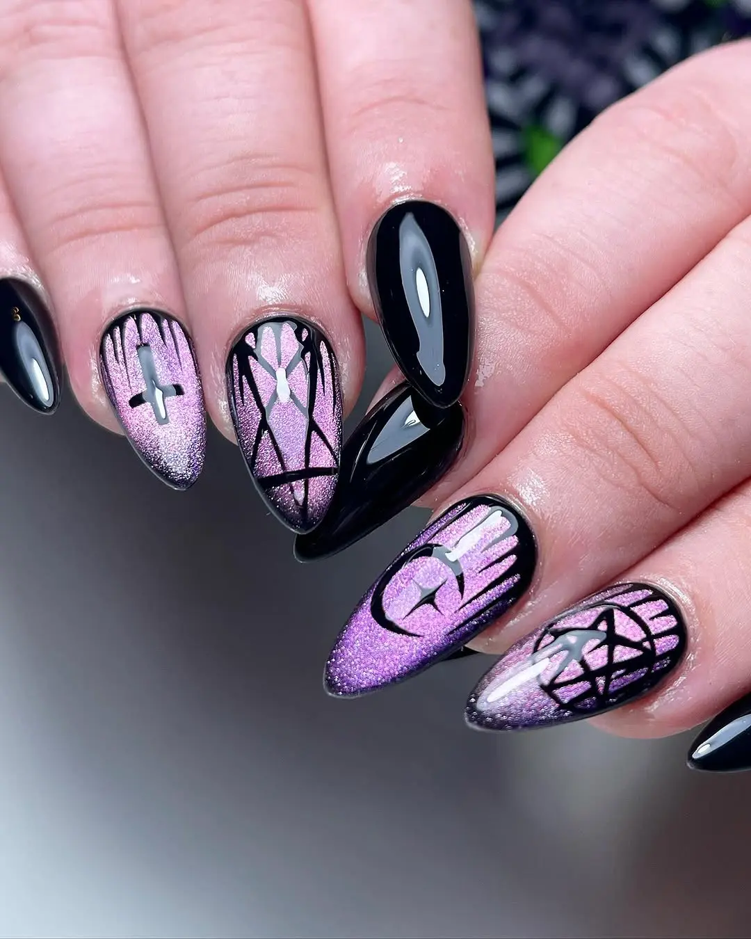 Enchanting black and purple glitter nail art