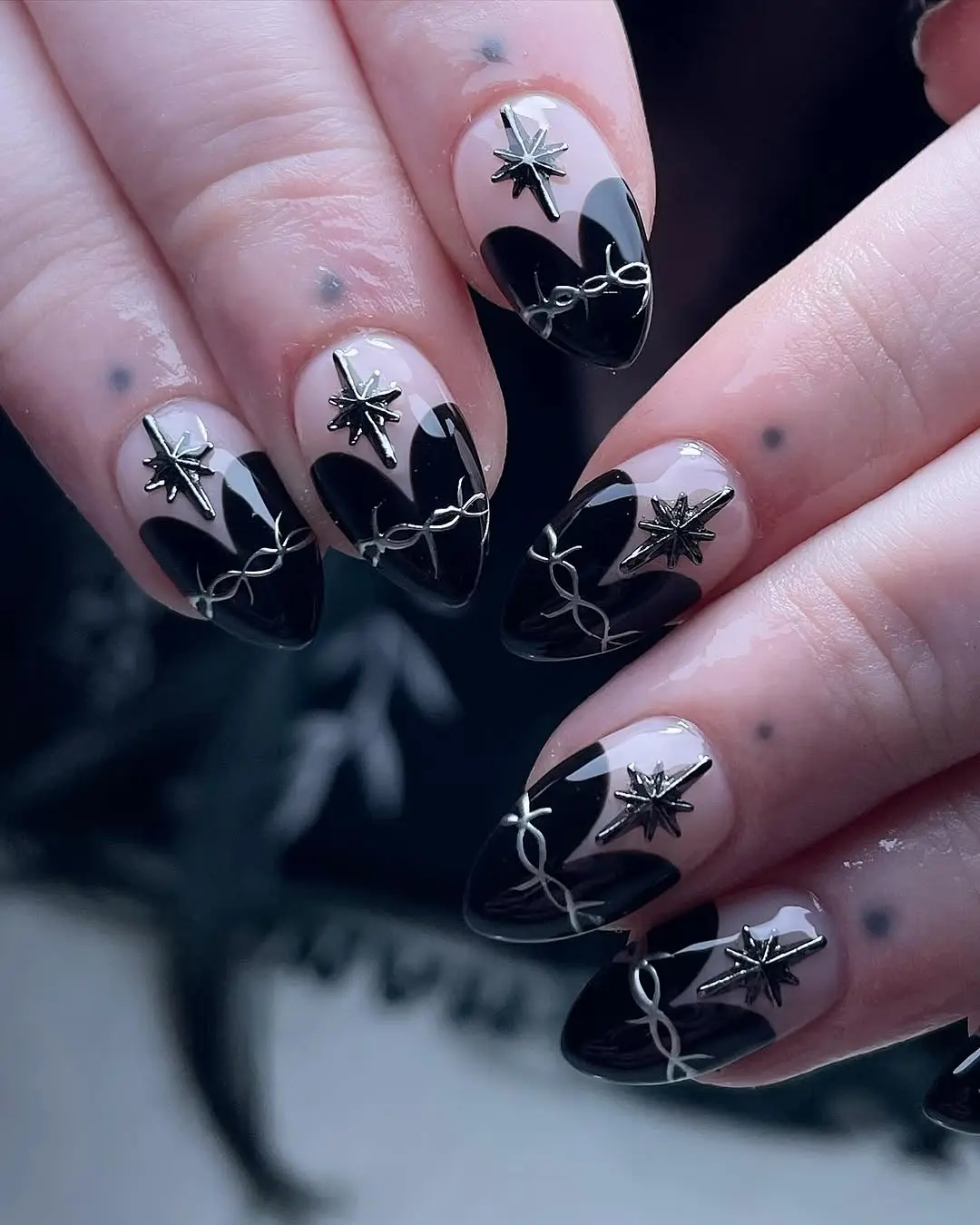 Elegant black and silver witchy nail art