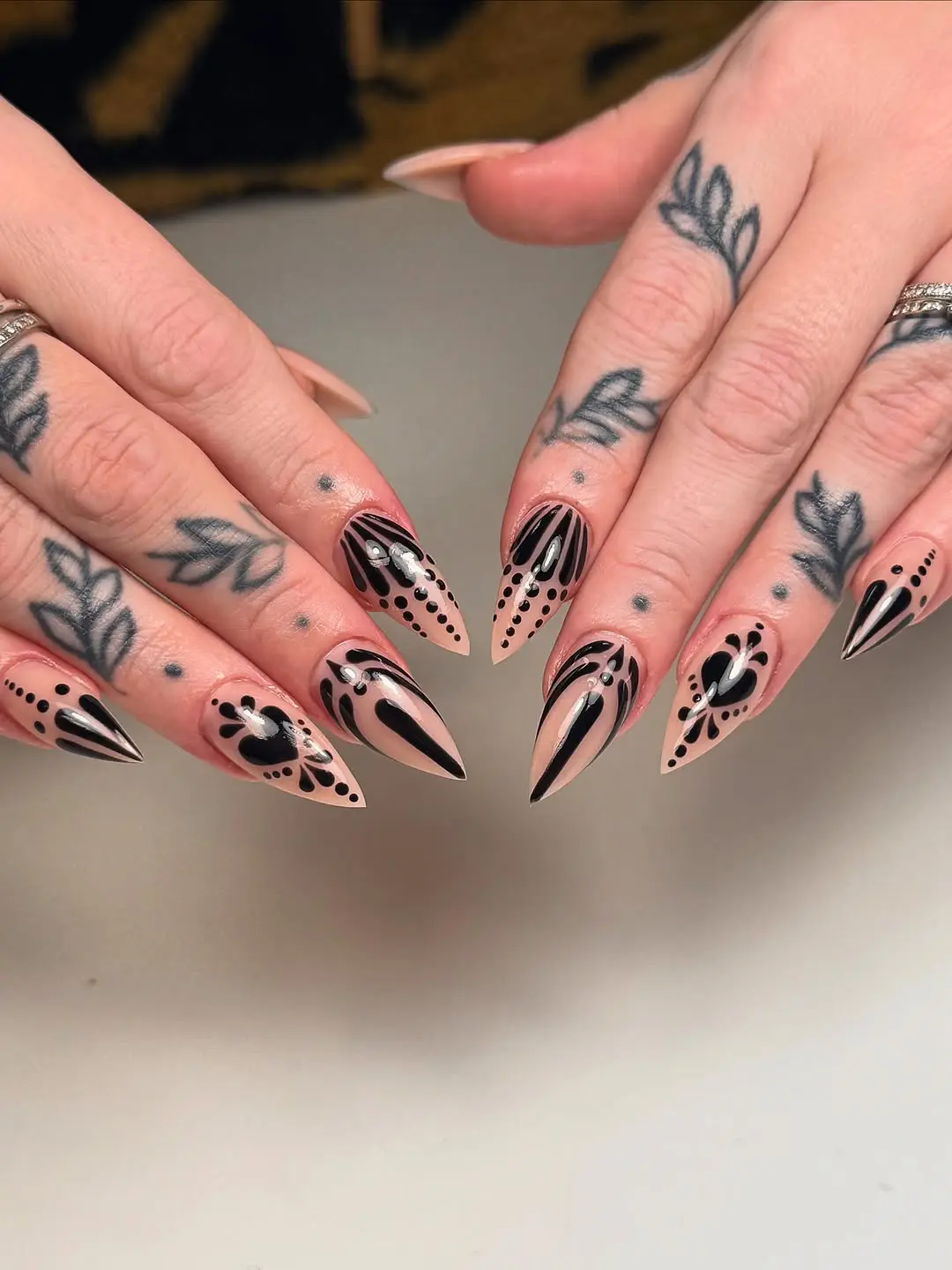 Edgy black and white witchy nail art
