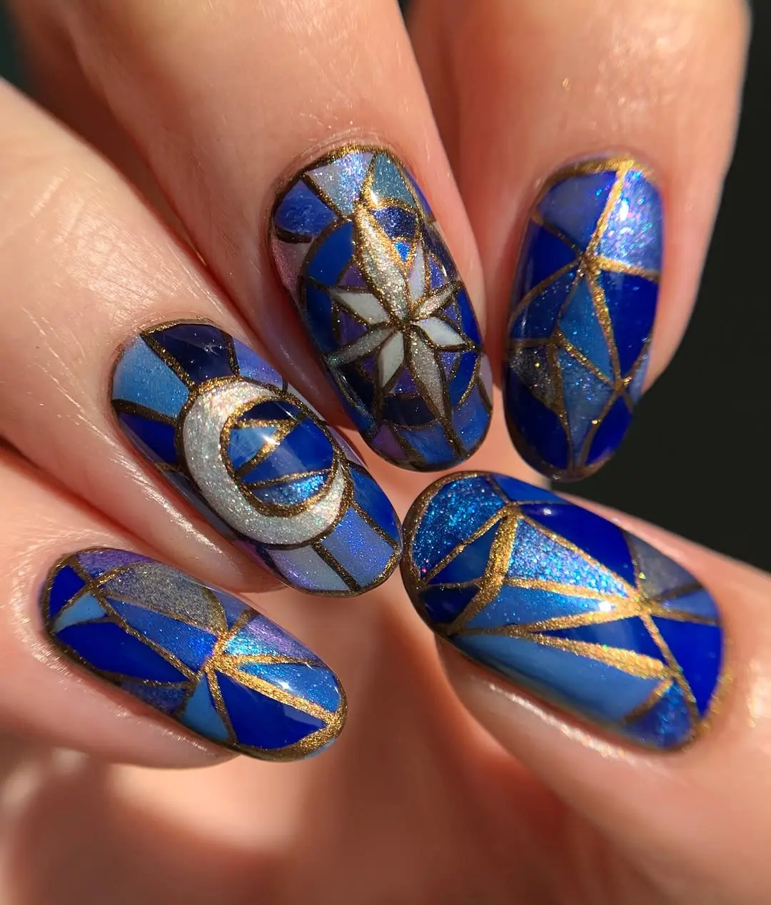 Chic geometric witchy nails with moon accents