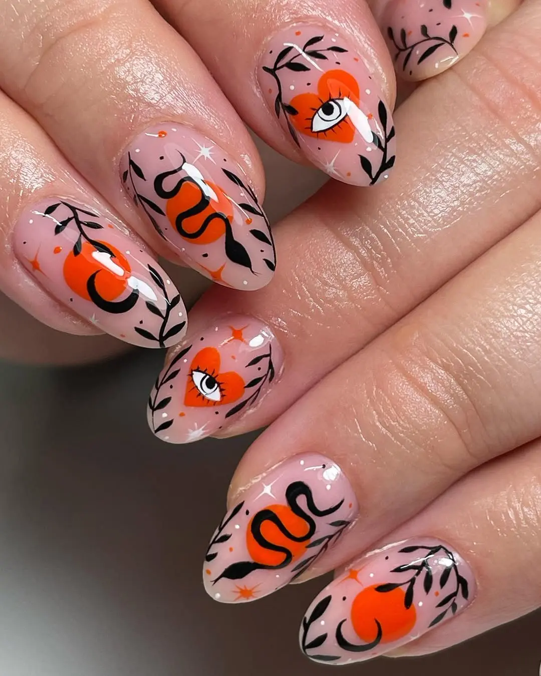 Vibrant Witchy Nails with Intricate Designs