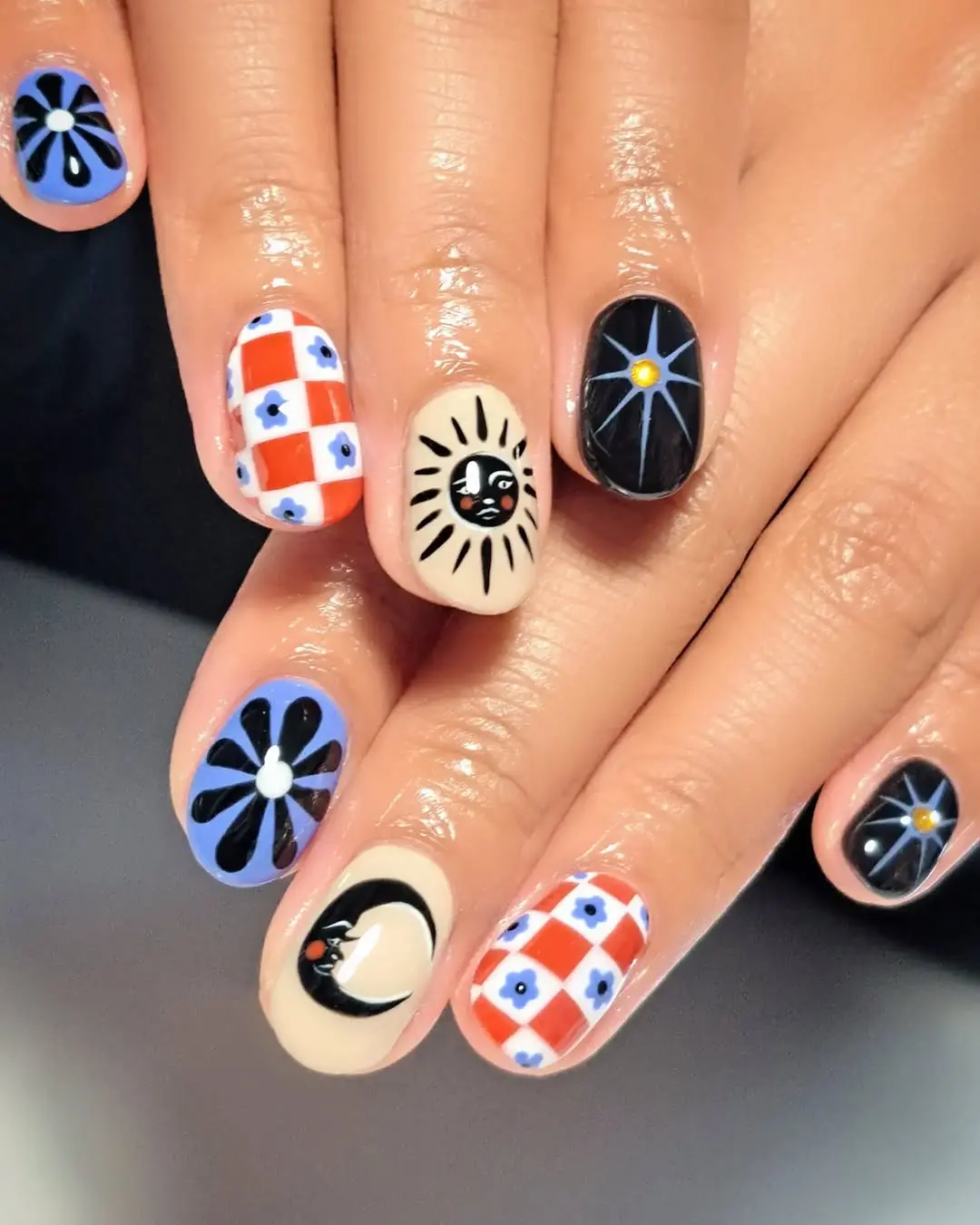 Vibrant Witchy Nail Art with Unique Patterns