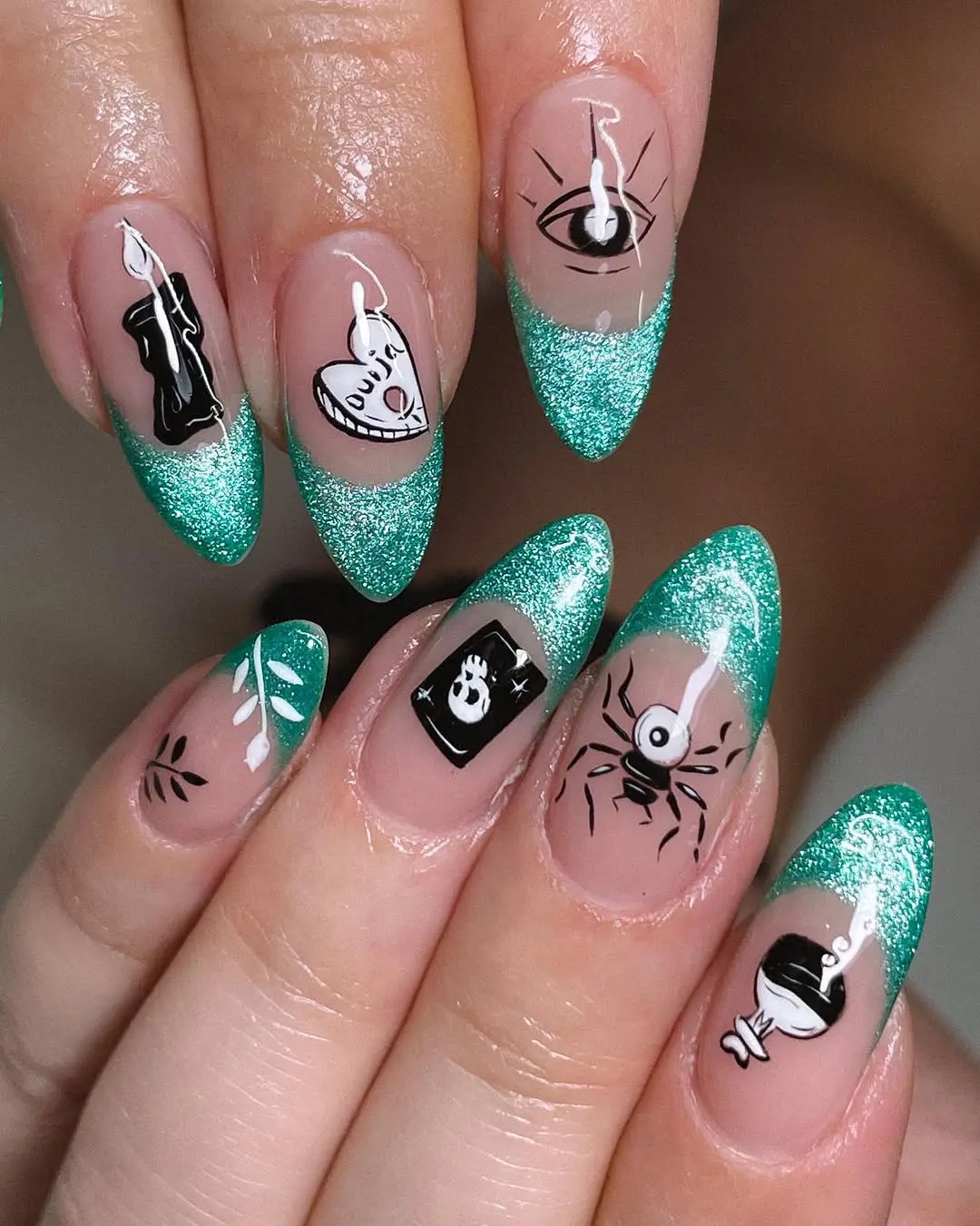 Sparkling nails with a witchy twist