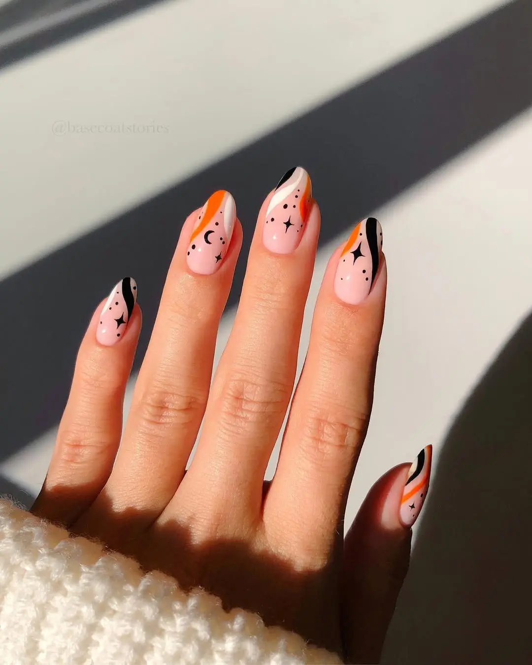 Colorful witchy nails with playful designs