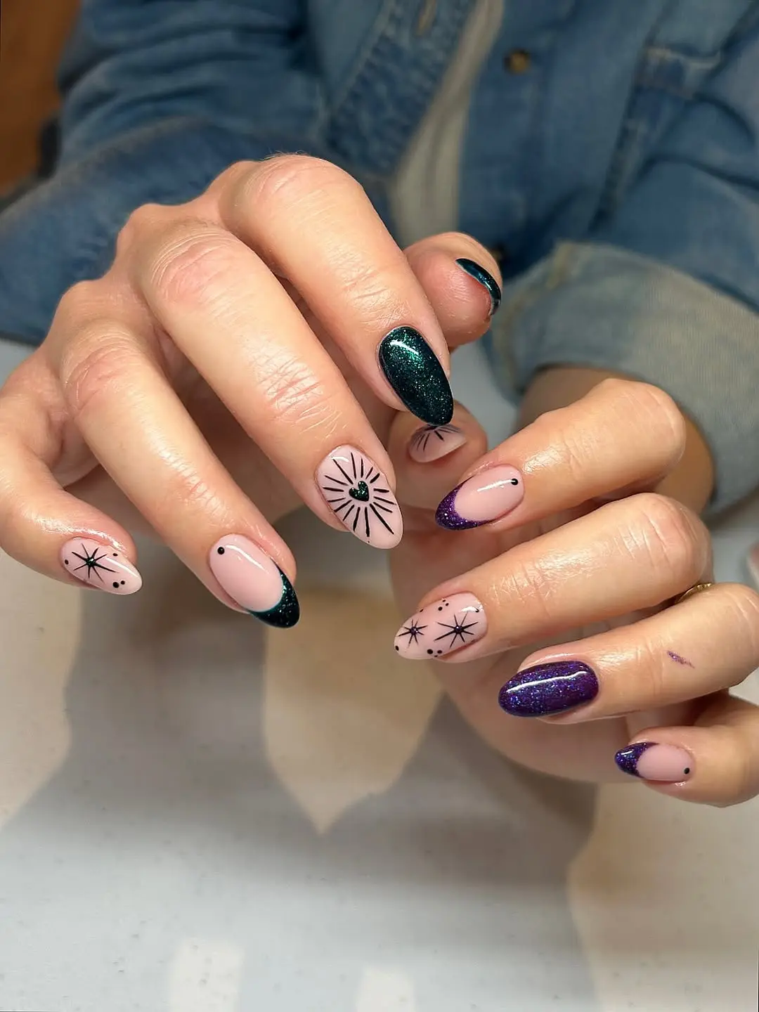 Enchanting nails with starry designs and glitter