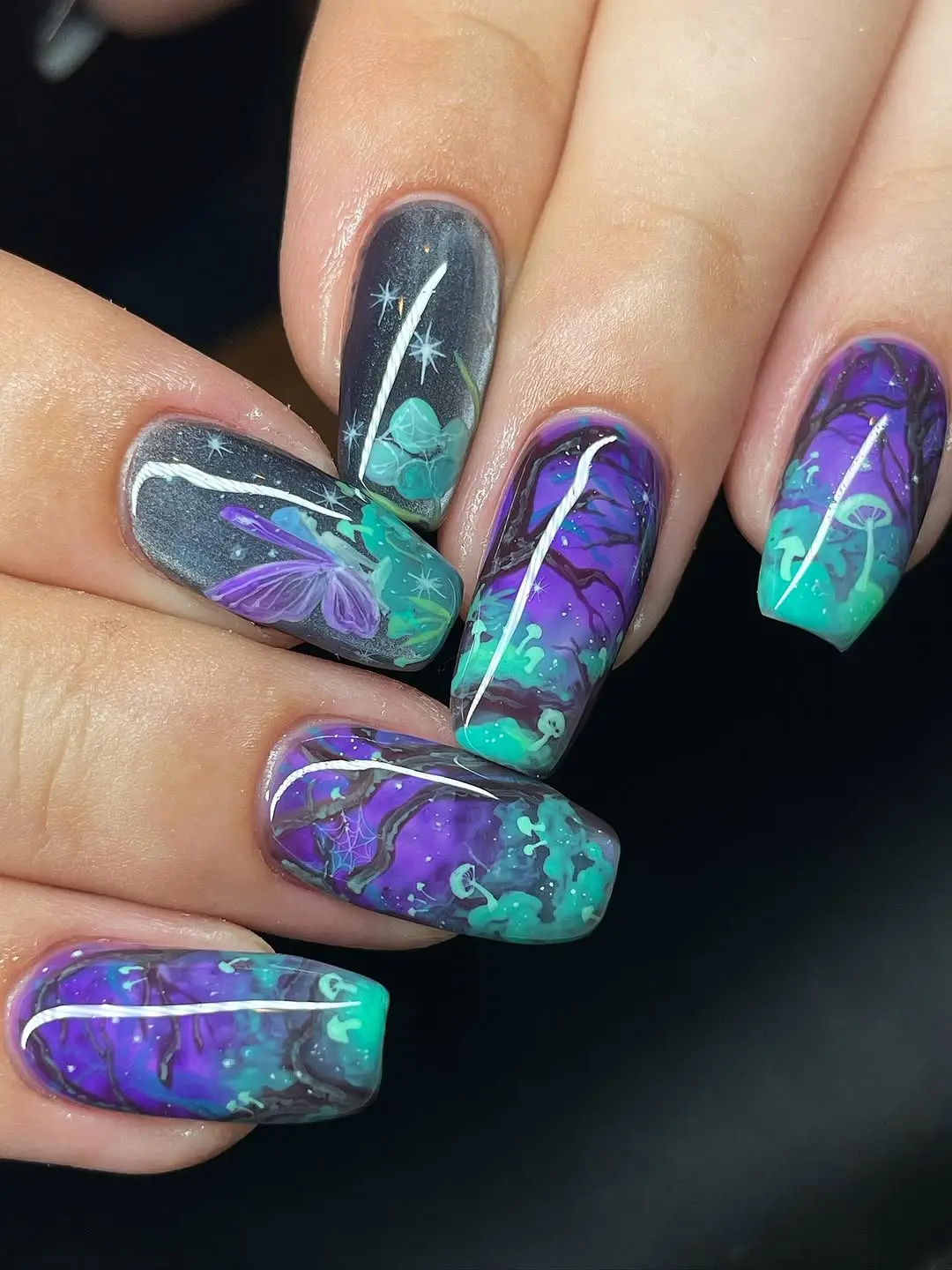 Enchanting hues with mystical designs for nails