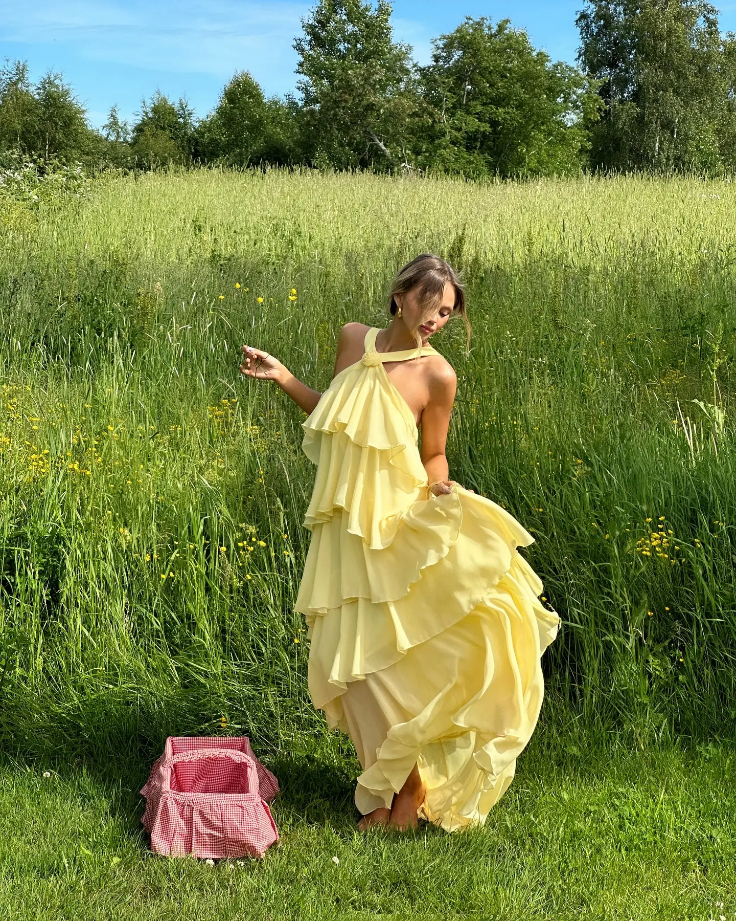 A flowy yellow dress for summer elegance