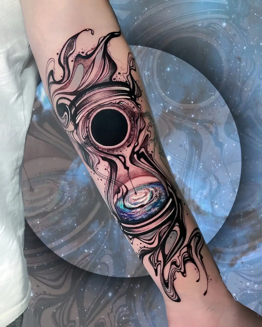 Stylish hourglass tattoo with cosmic elements