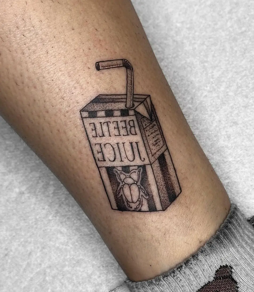 Creative Beetlejuice Juice Box Tattoo Design