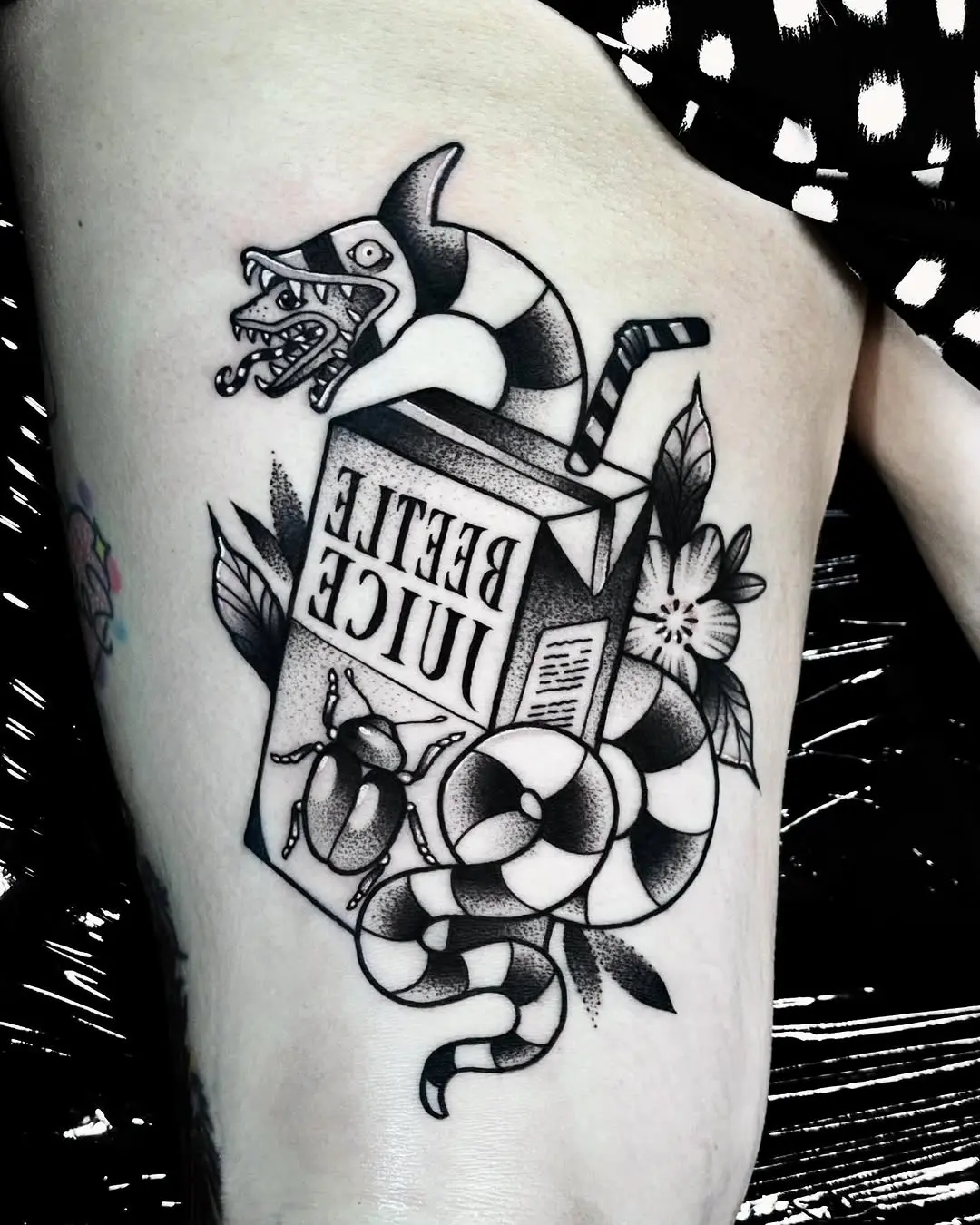 Unique Beetlejuice Tattoo with Playful Elements