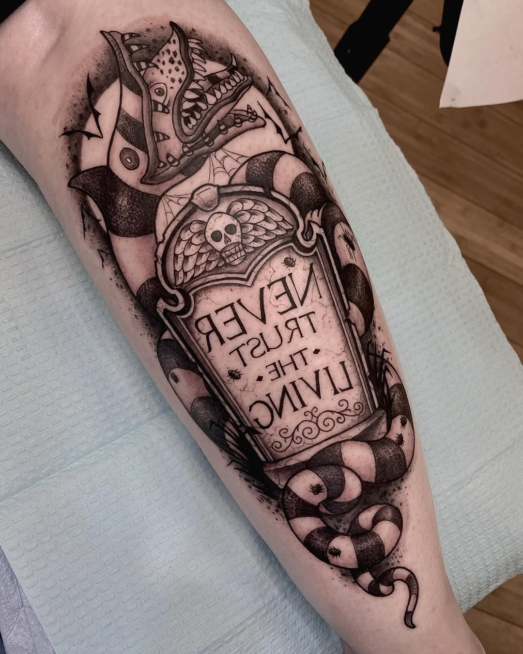 Intricate Beetlejuice Tattoo with Dark Vibes