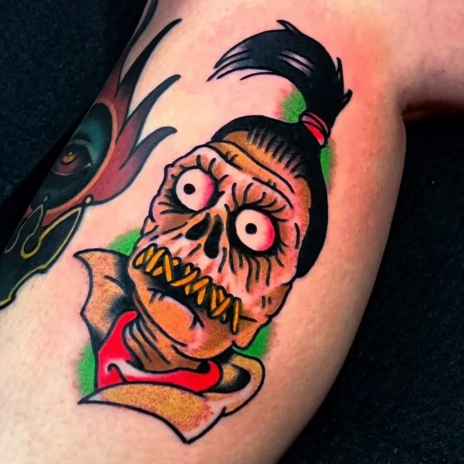 Colorful Beetlejuice-Inspired Skeleton Tattoo