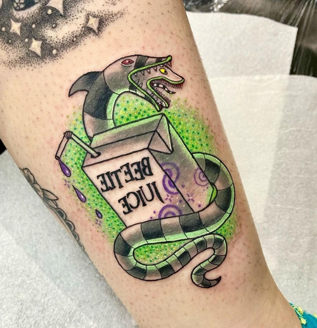 Creative Beetlejuice Snake Tattoo Design