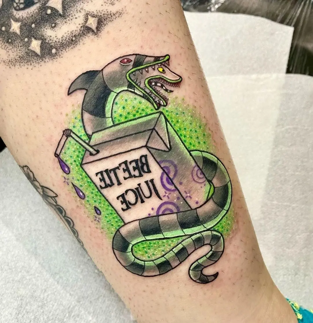Creative Beetlejuice Snake Tattoo Design