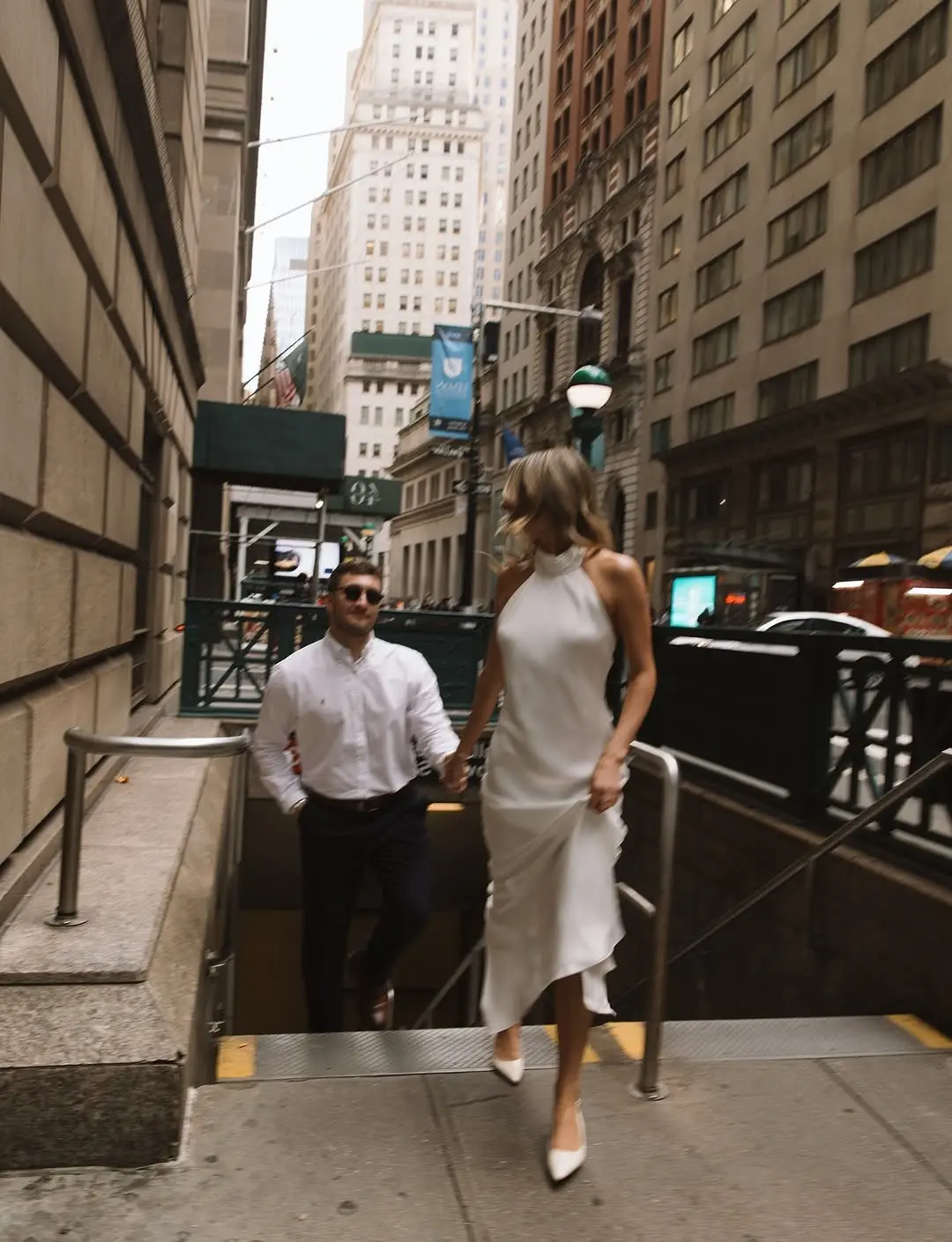 Chic urban couple in stylish engagement attire