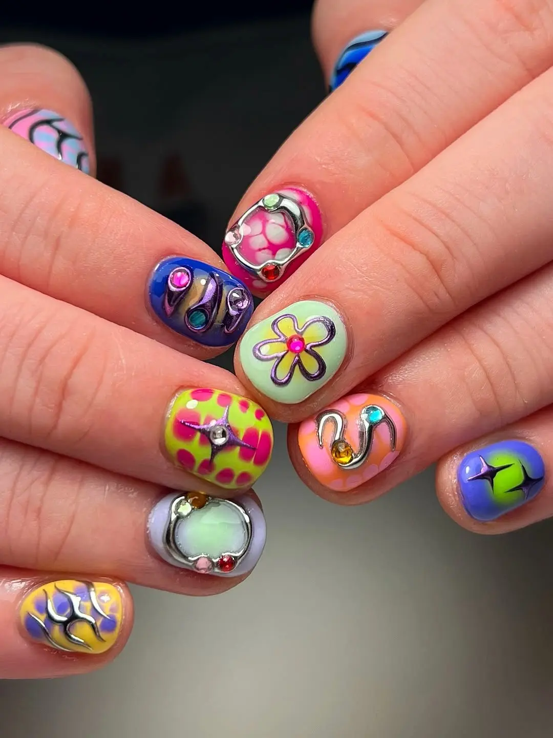 Vibrant nails with playful designs and colors