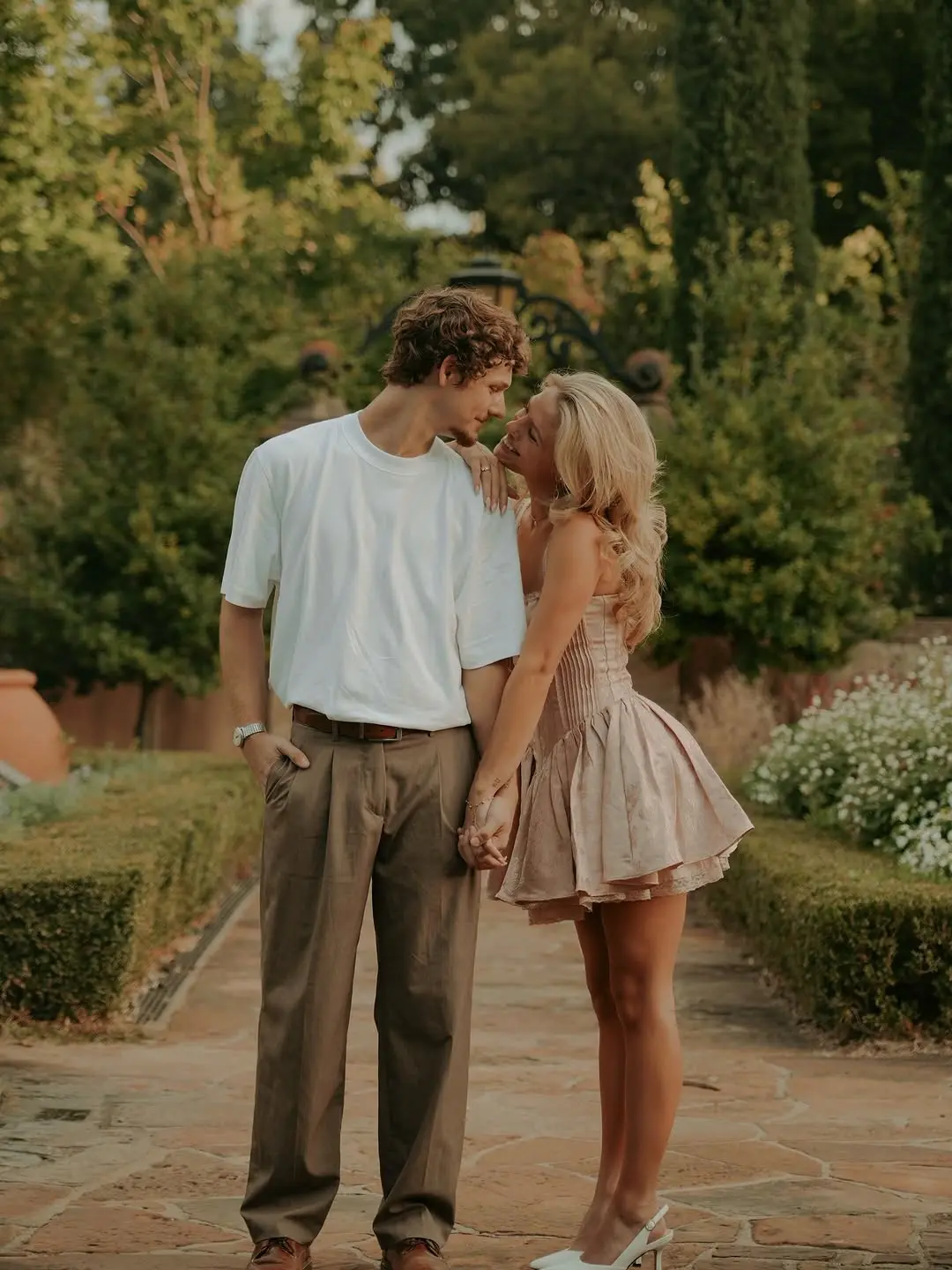 Charming couple in a garden setting