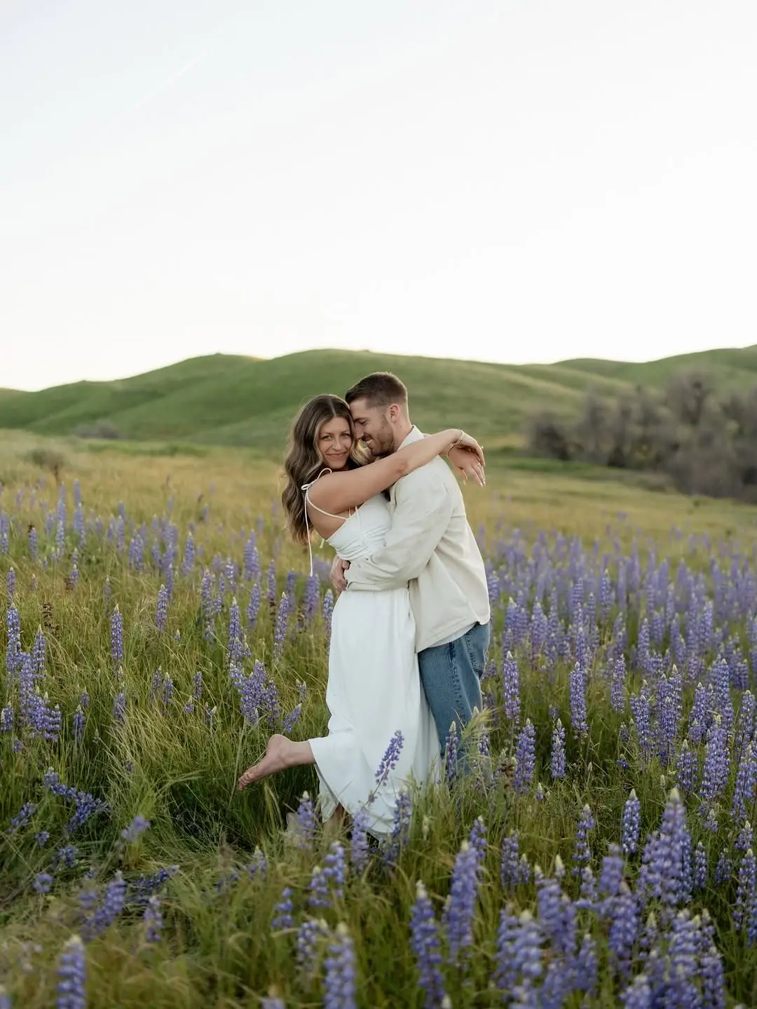Charming couple in a serene floral setting