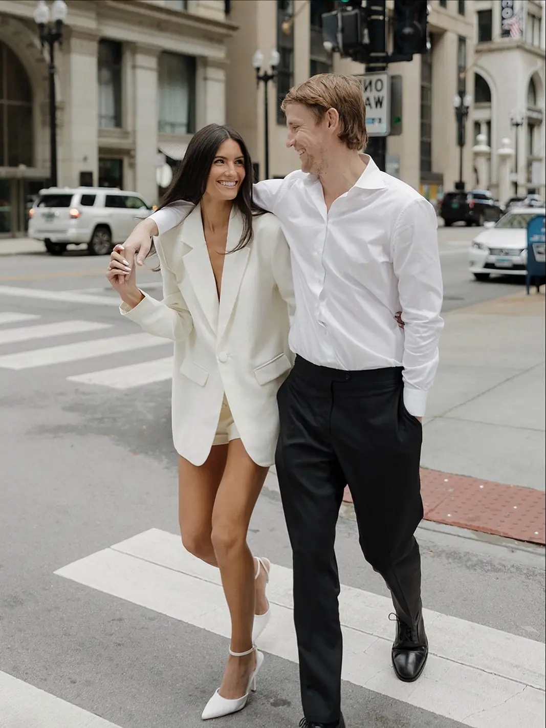 Stylish couple in chic urban attire