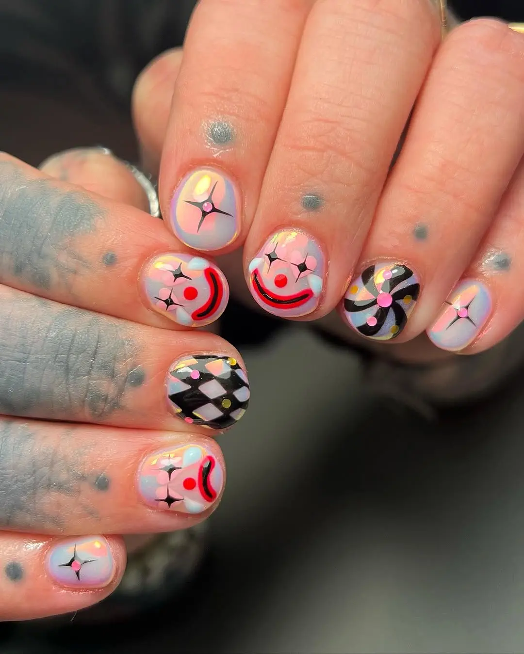 Vibrant clown-inspired nail art designs