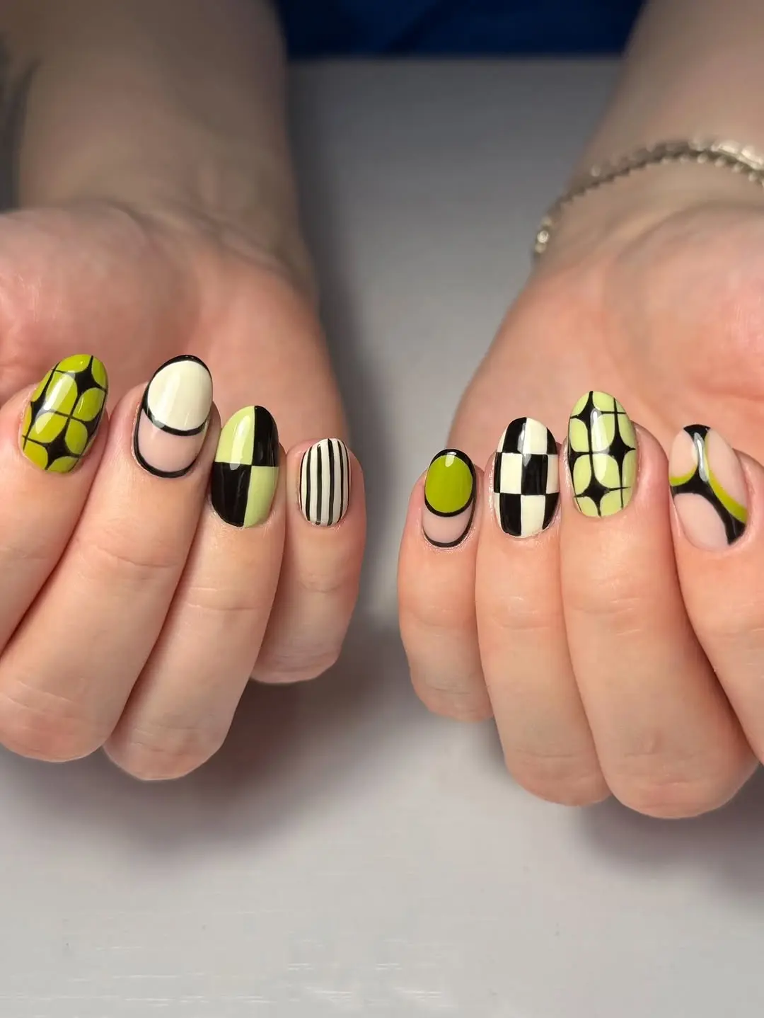Vibrant geometric patterns on stylish nails