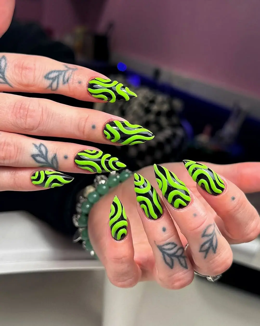 Bold green swirl design for funky nails