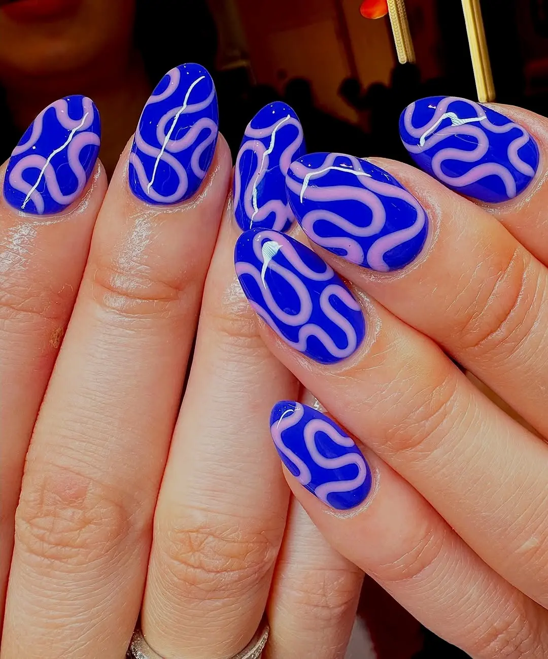 Vibrant Blue and Pink Funky Nail Art