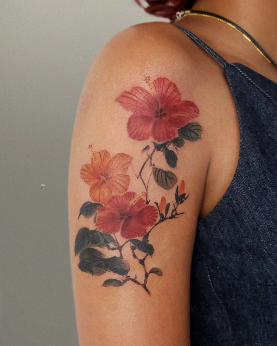 Vibrant hibiscus tattoo showcasing nature's beauty