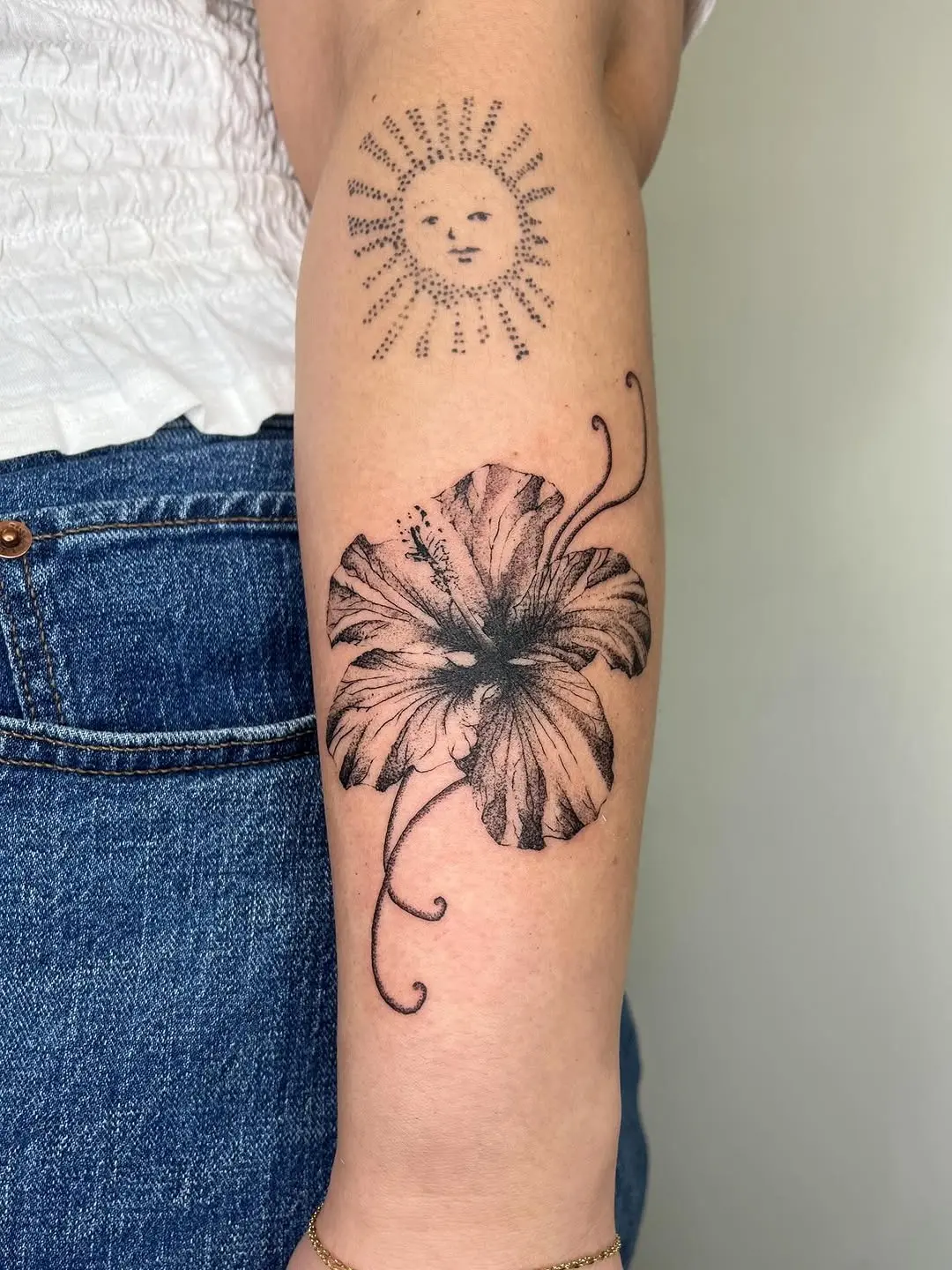 Stunning black ink hibiscus tattoo design