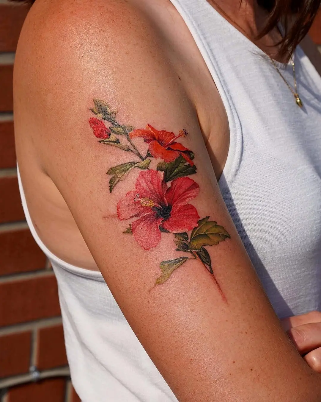Stunning Hibiscus Tattoo with Lush Detailing