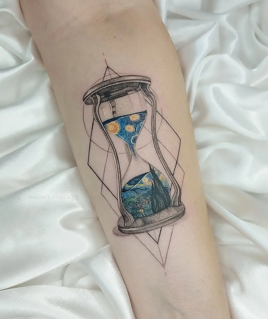 Stunning hourglass tattoo with starry night theme