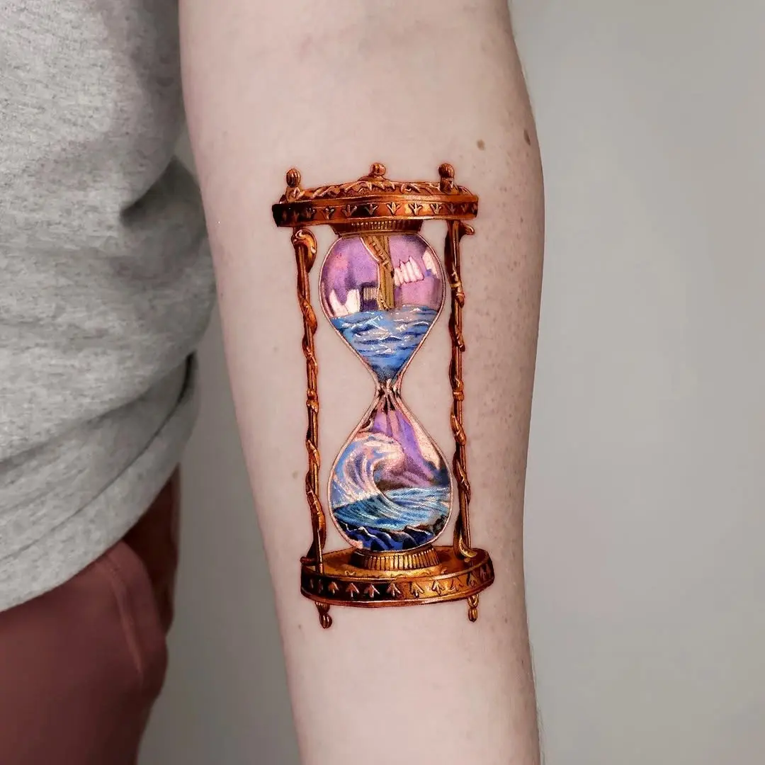 Beautiful hourglass tattoo with ocean vibes