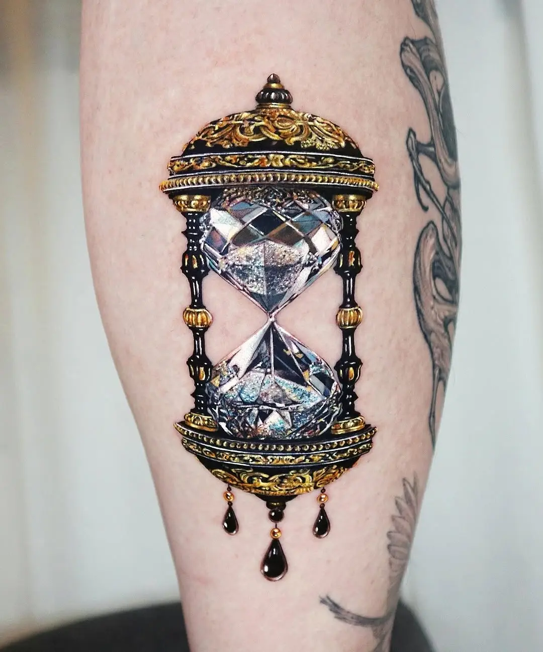 Stunning vintage hourglass tattoo with intricate details
