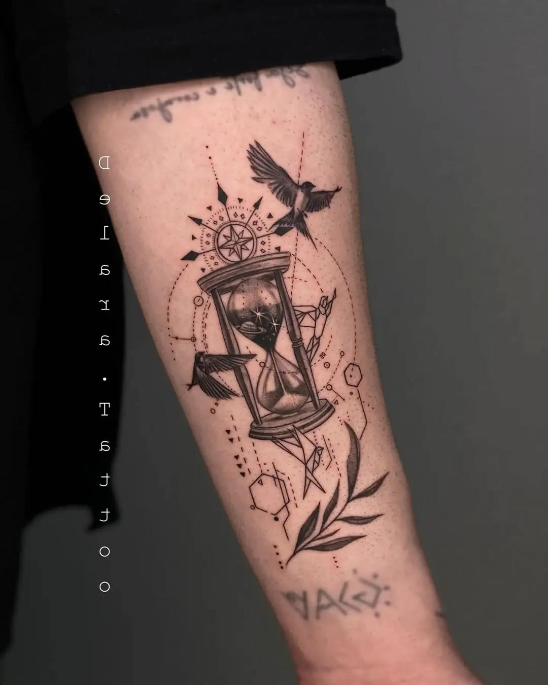 Stylish hourglass tattoo with intricate details