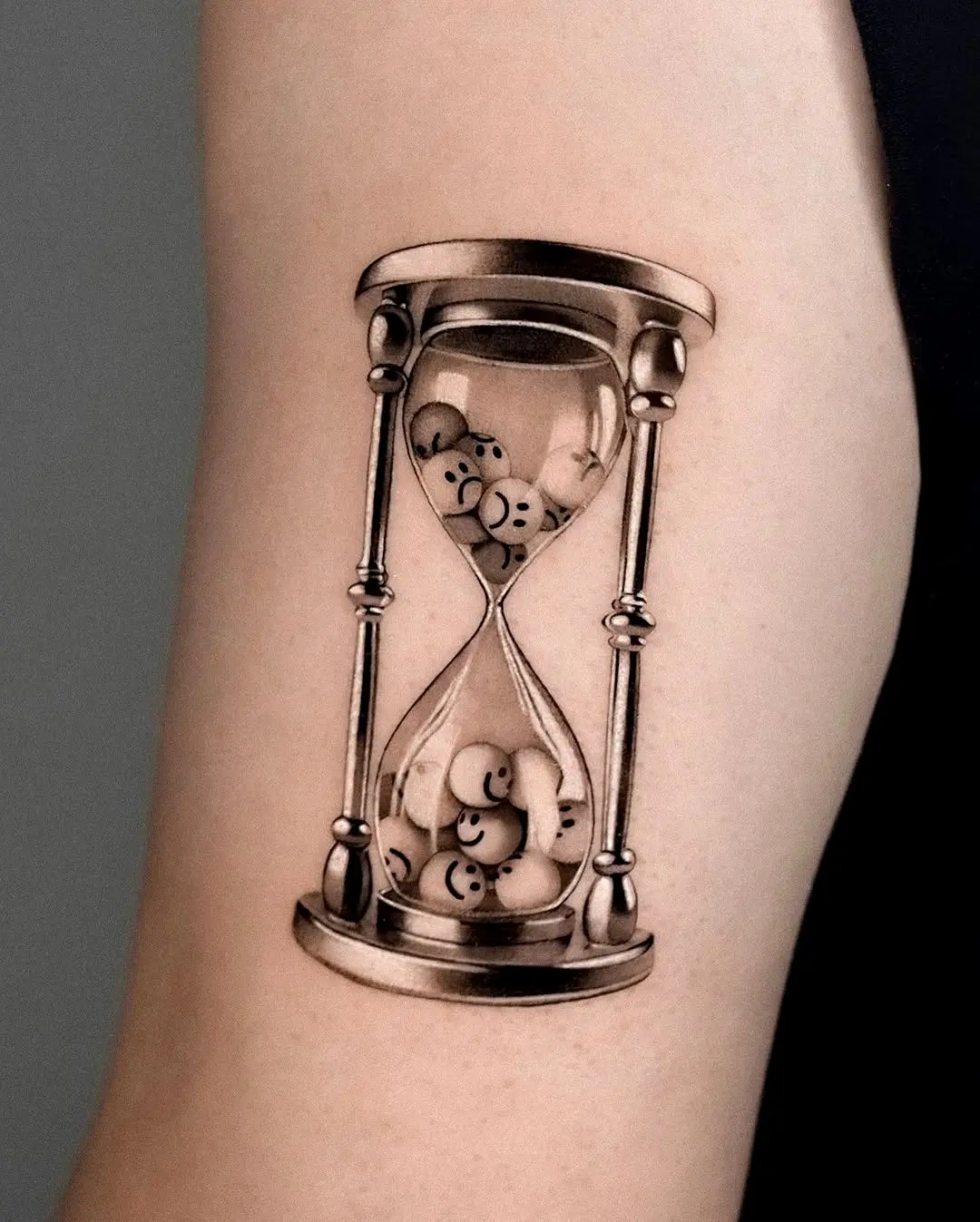 Unique Hourglass Tattoo with Smiley Faces