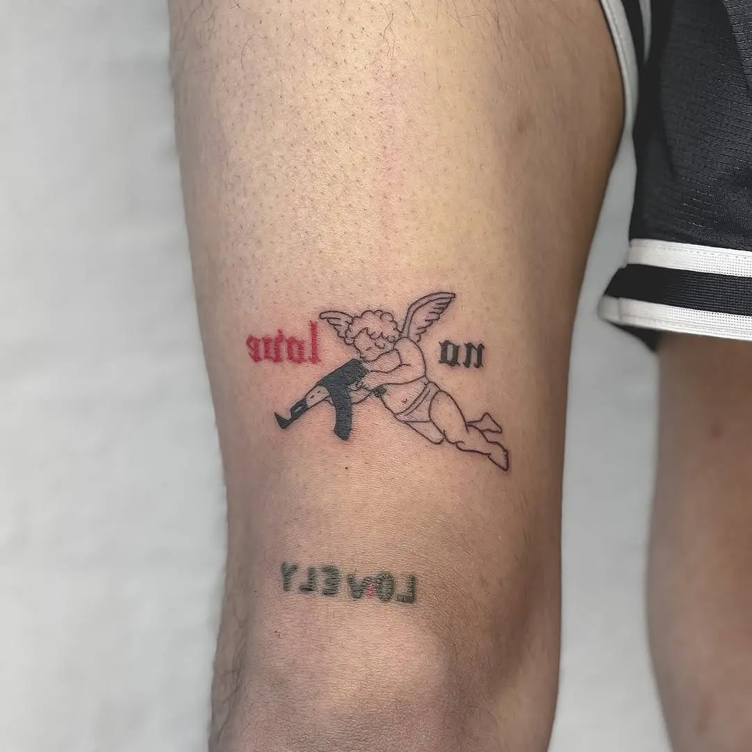 Unique Cupid Tattoo with Bold Statement