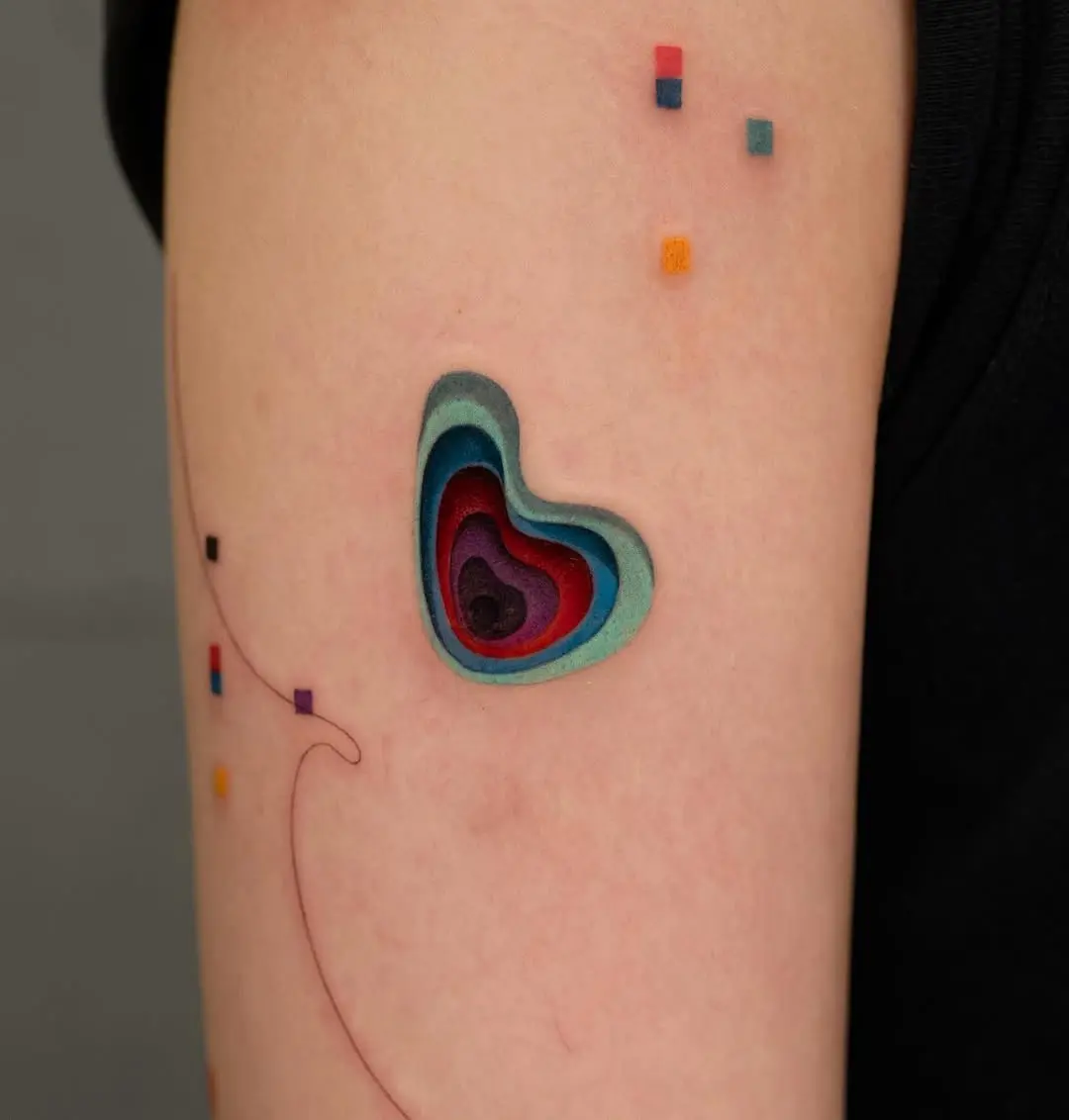 Colorful layered heart tattoo with vibrant details