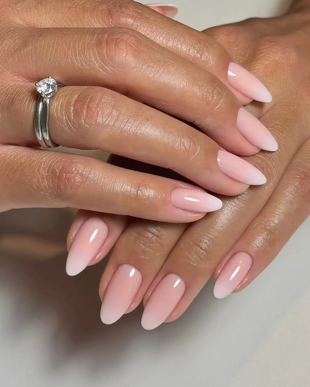 Elegant ombre nails with soft pink hues