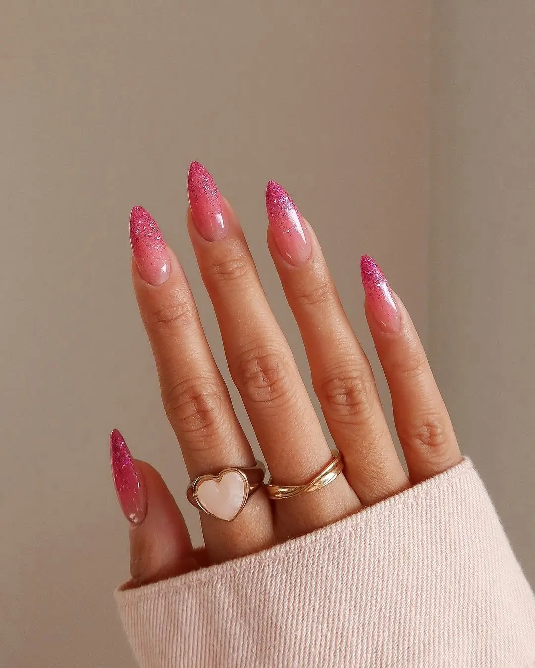 Trendy pink stiletto ombre nails for glam