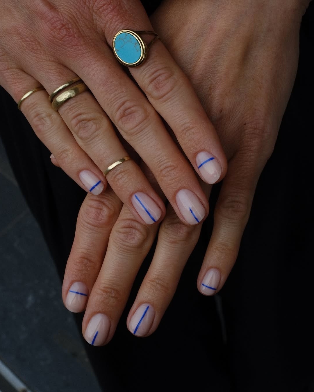 Trendy minimalist nails with blue accents