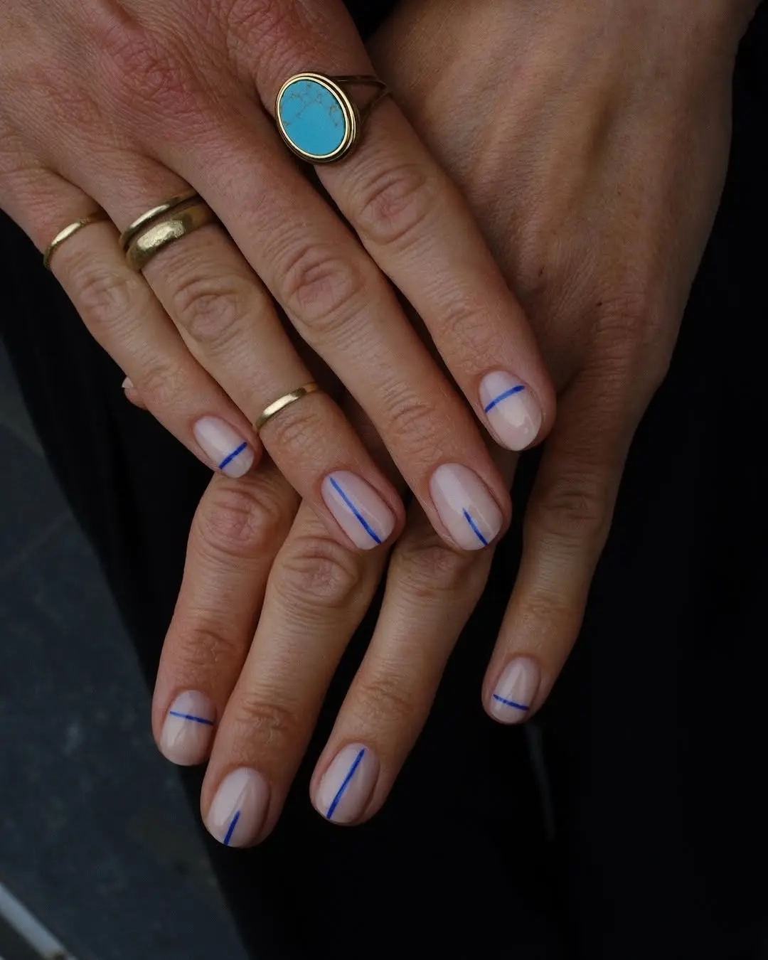 Trendy minimalist nails with blue accents