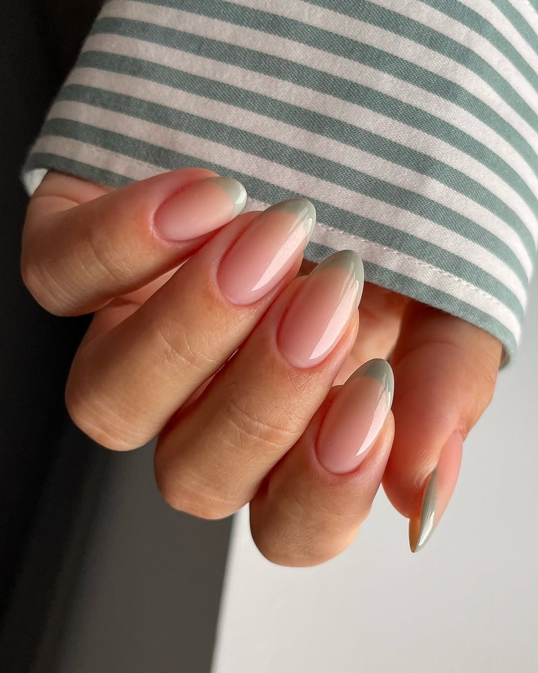 Elegant nails with pastel green detailing