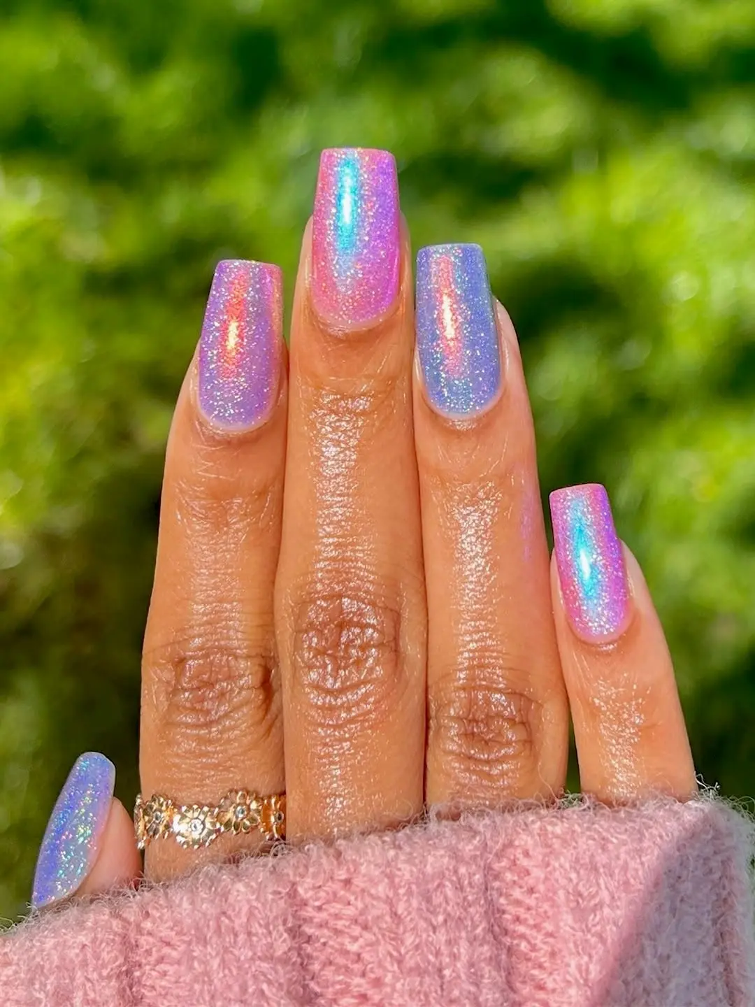 Radiant spring glitter nails with rainbow accents