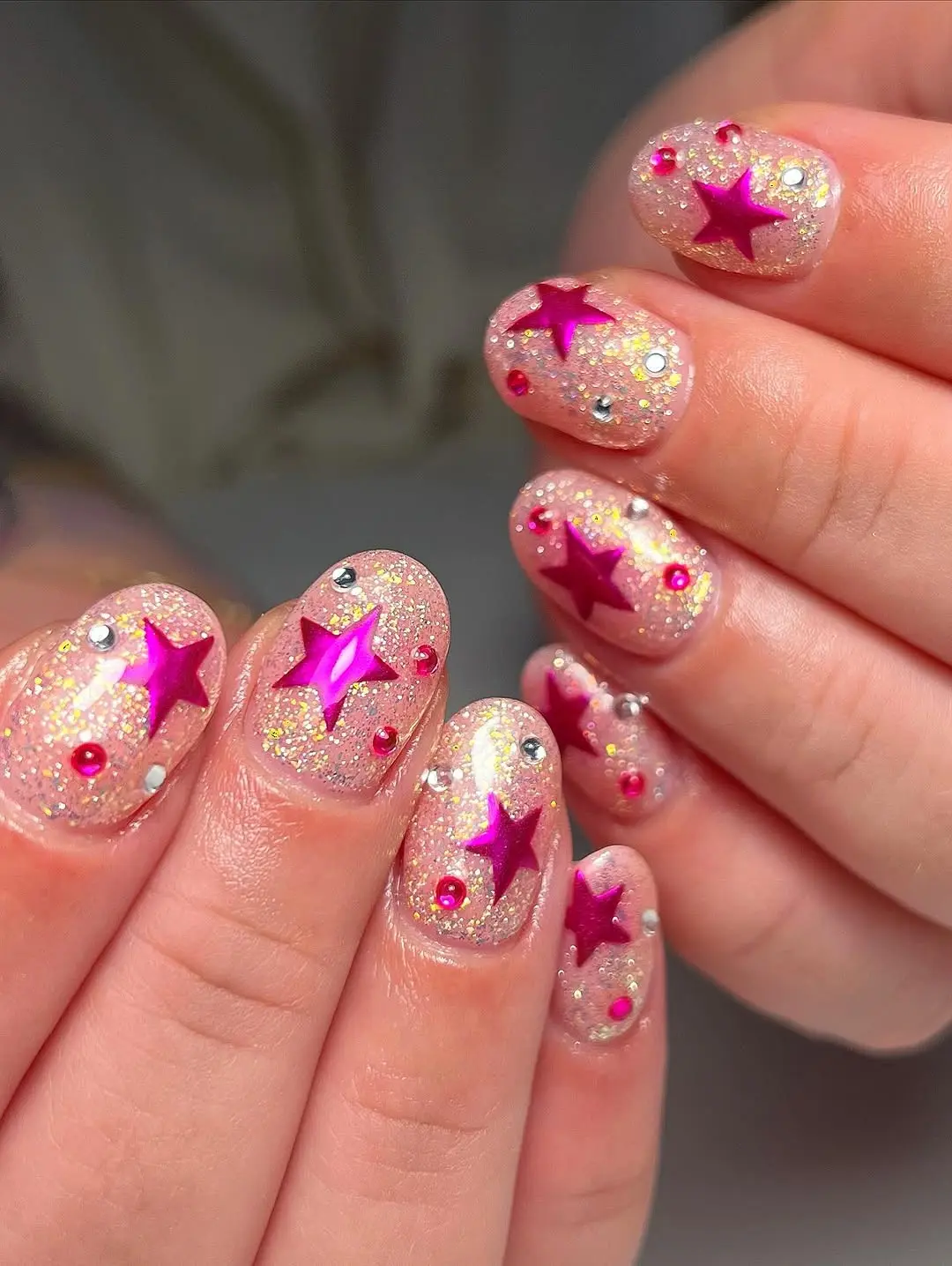 Shimmering glitter nails with playful accents