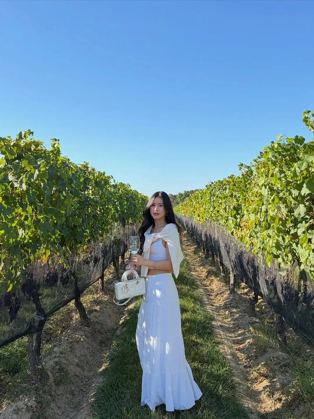 Chic white dress for vineyard strolls