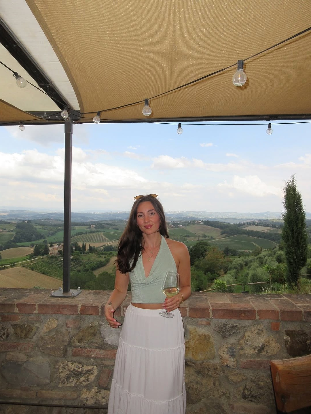 Chic summer winery look with serene landscape