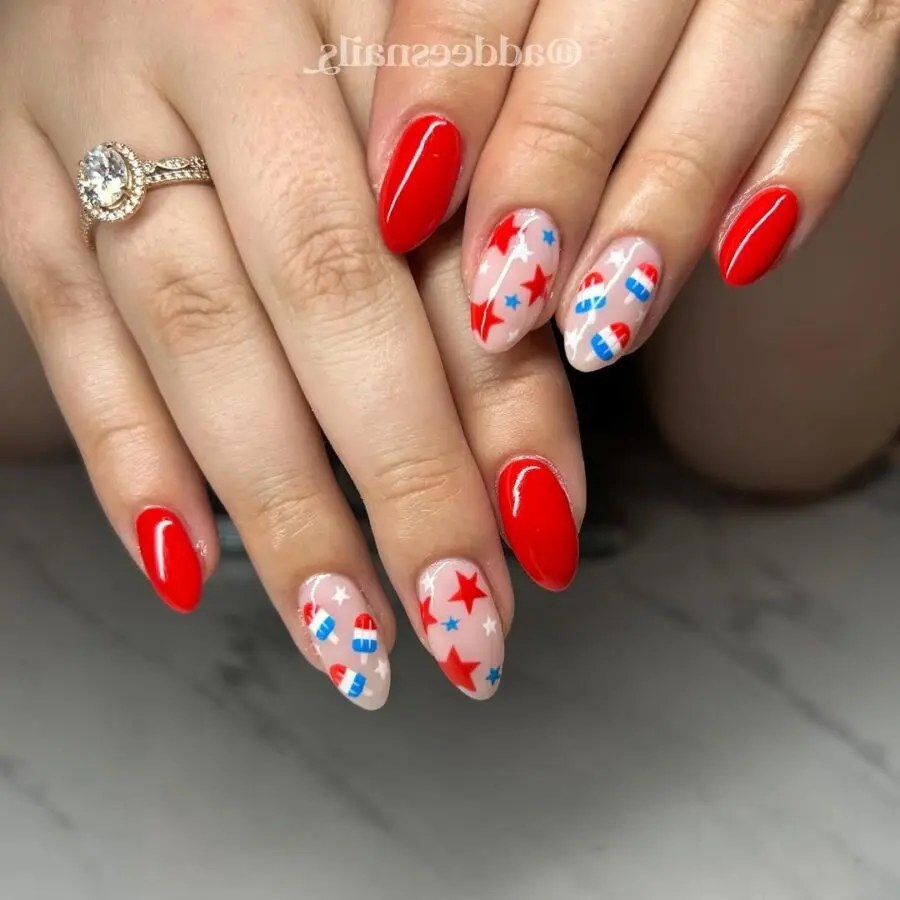 Festive red nails with patriotic accents