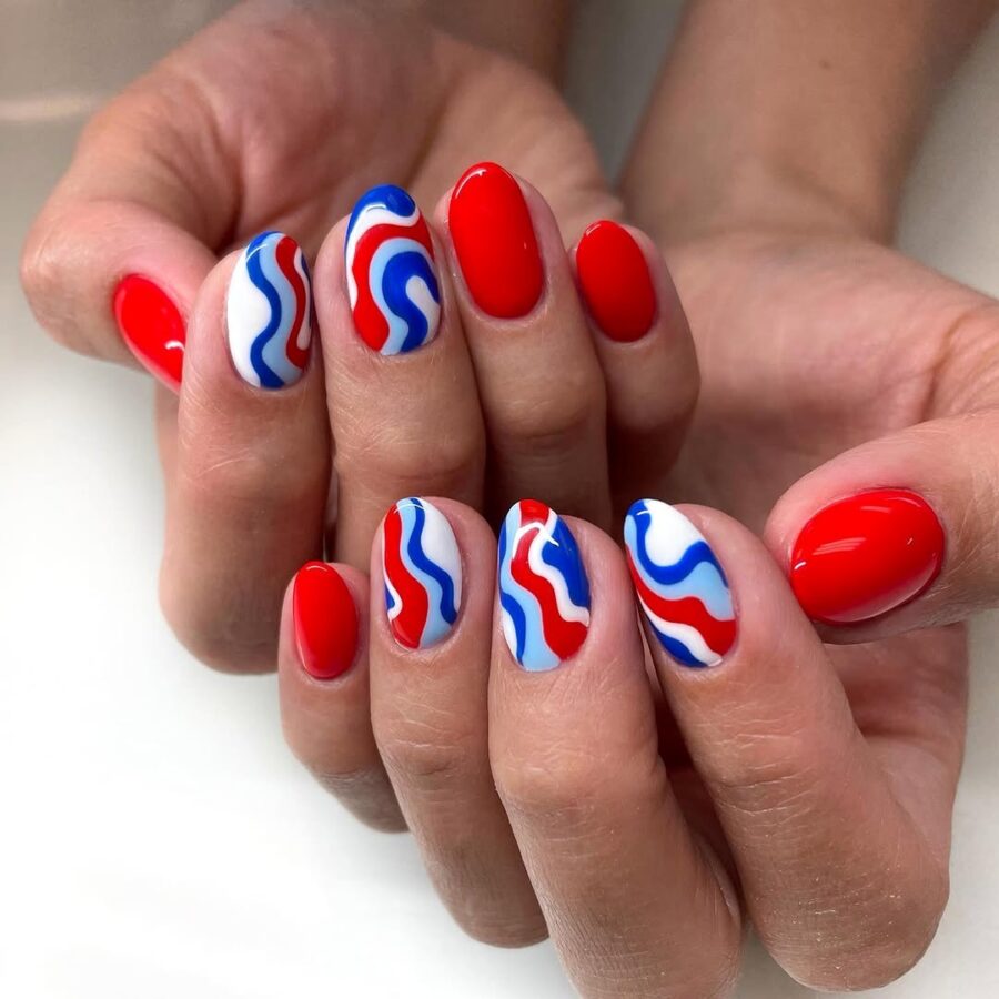 Stylish Red, White, and Blue Wave Nails