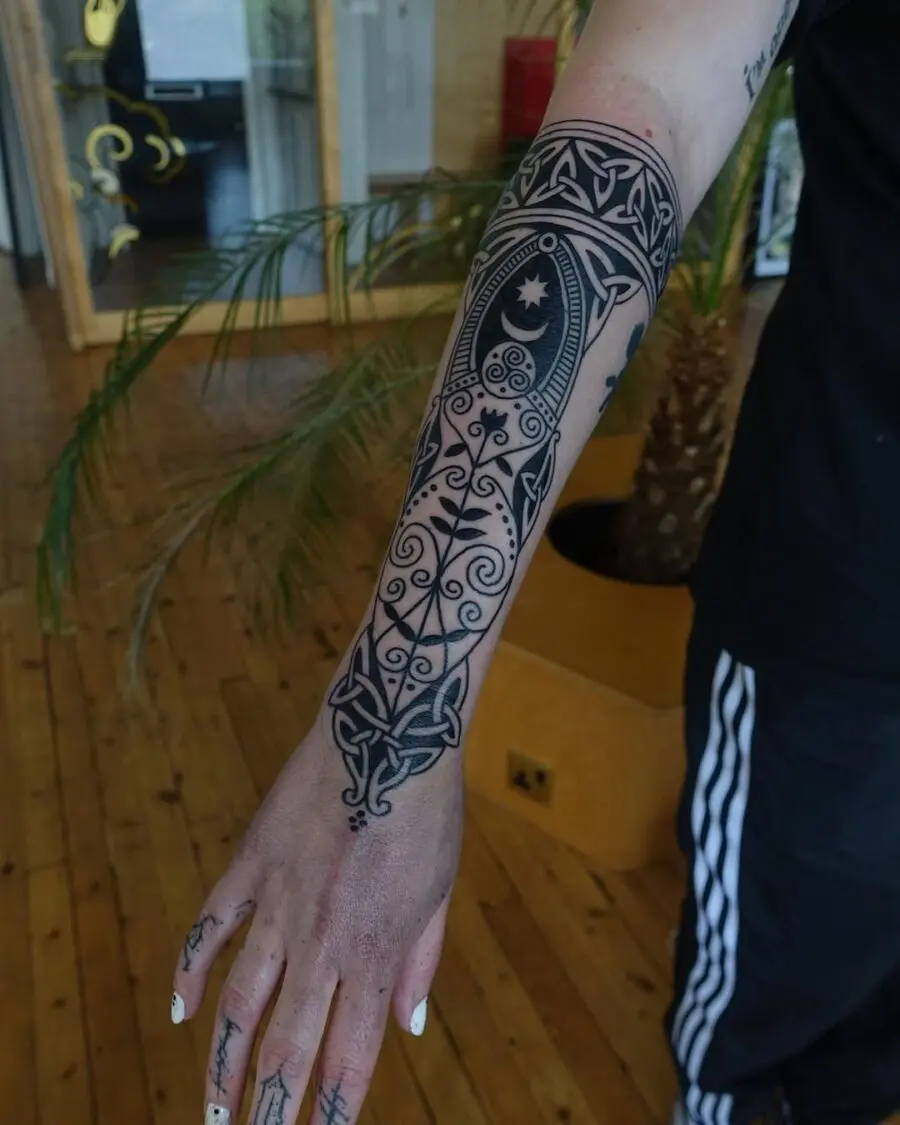 Elegant Celtic tattoo with intricate designs